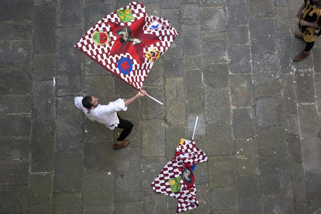 Photography holidays in Italy - high view of flag throwers